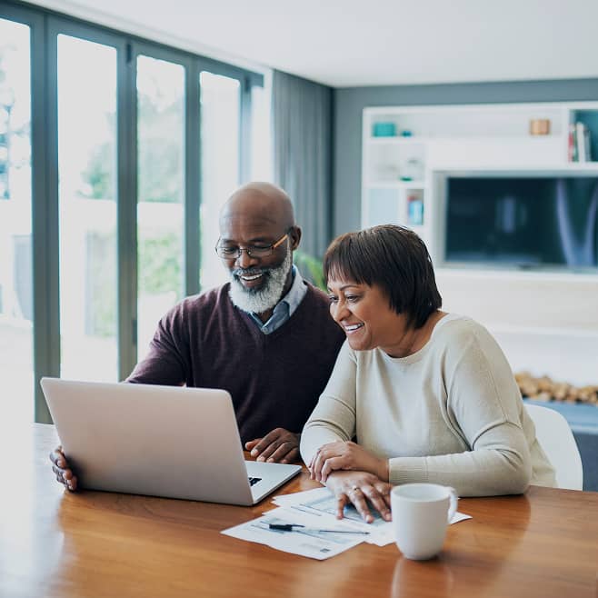 Couple looking at a computer screen